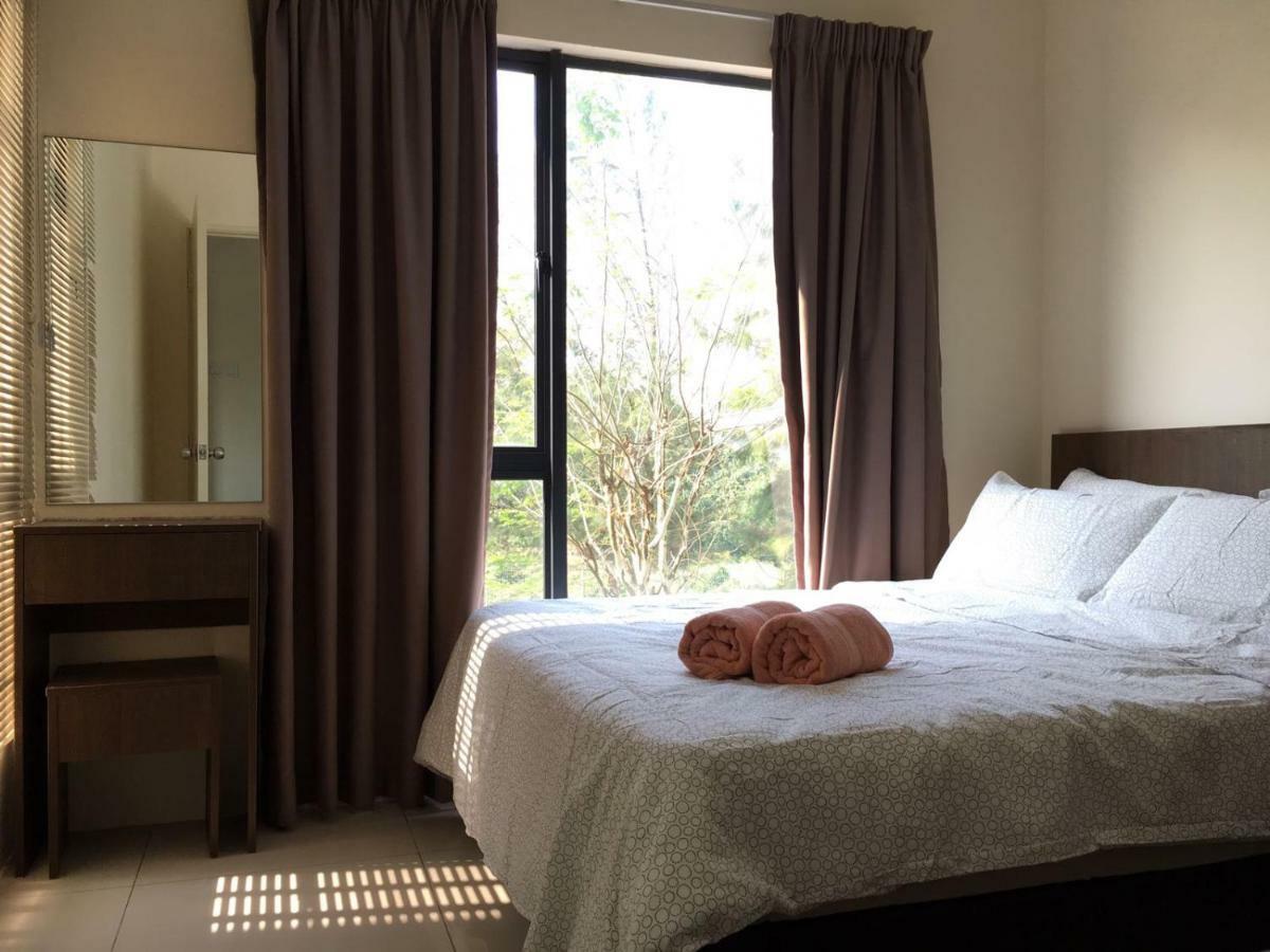 Cozy Swiss Garden Beach Resort Residence Kampung Sungai Karang Extérieur photo
